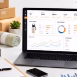 Laptop showing a sales dashboard beside packaged products ready for listing